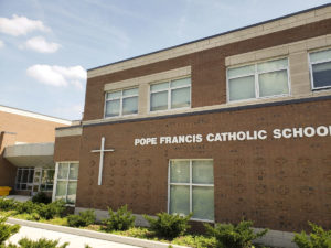 A photo of Pope Francis Catholic School in Kleinburg in summer
